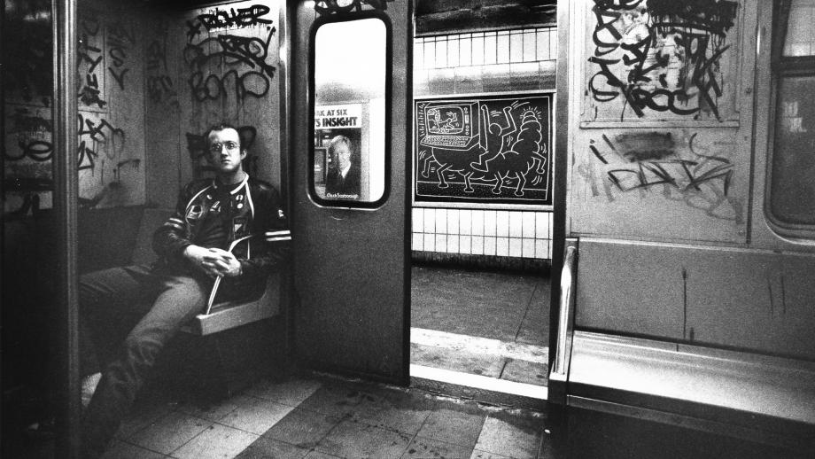 “Keith Haring in subway car”, Tseng Kwong Chi, 1983, Dazed & Confused